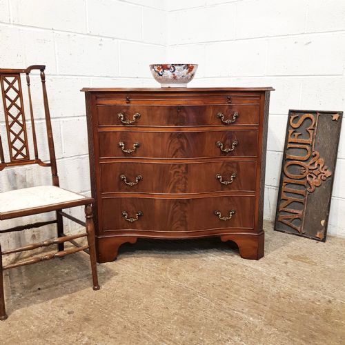 Antique Mahogany Serpentine Front Chest of Drawers with Brushing Slide C1920