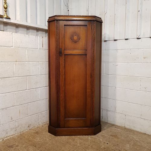 fig 1. ANTIQUE CARVED OAK CORNER WARDROBE C1920