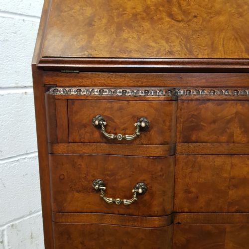 fig 1. ANTIQUE BURR WALNUT SERPENTINE SHAPED BUREAU BY MAPLES & CO. C1920