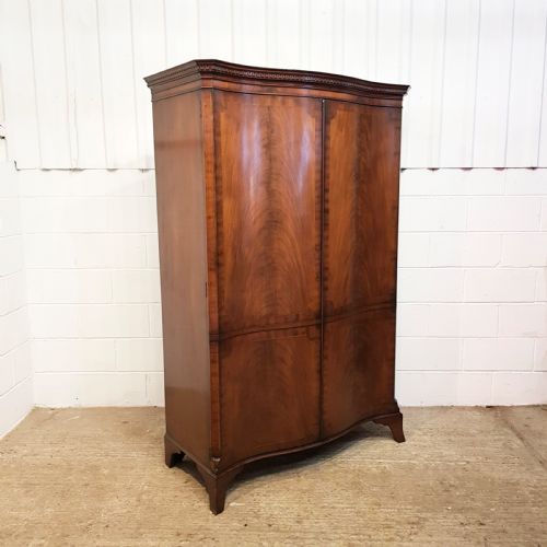 fig 1. ANTIQUE MAHOGANY SERPENTINE FRONT MAHOGANY DOUBLE WARDROBE C1910