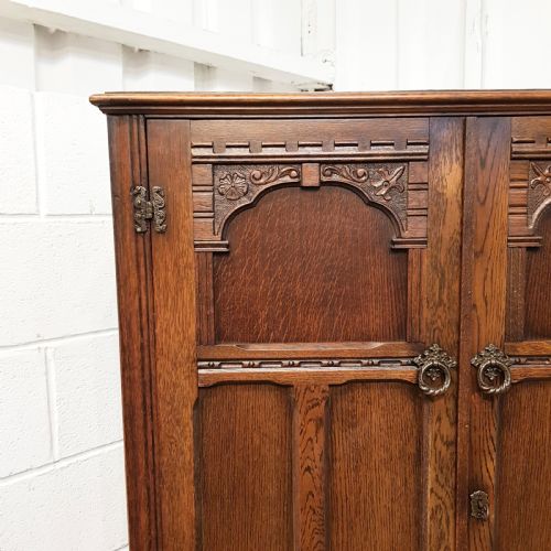 fig 1. ANTIQUE CARVED OAK SMALL FITTED WARDROBE 61” HIGH C1920