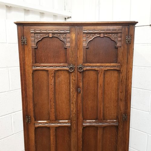 fig 2. ANTIQUE CARVED OAK SMALL FITTED WARDROBE 61” HIGH C1920