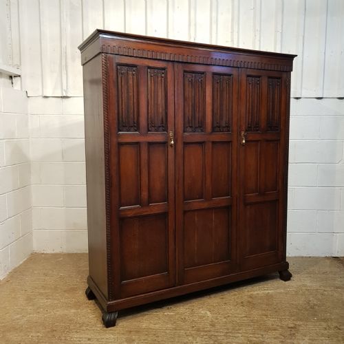 fig 2. ANTIQUE SMALL OAK LINEN FOLD TRIPLE WARDROBE BY WARING & GILLOWS C1920