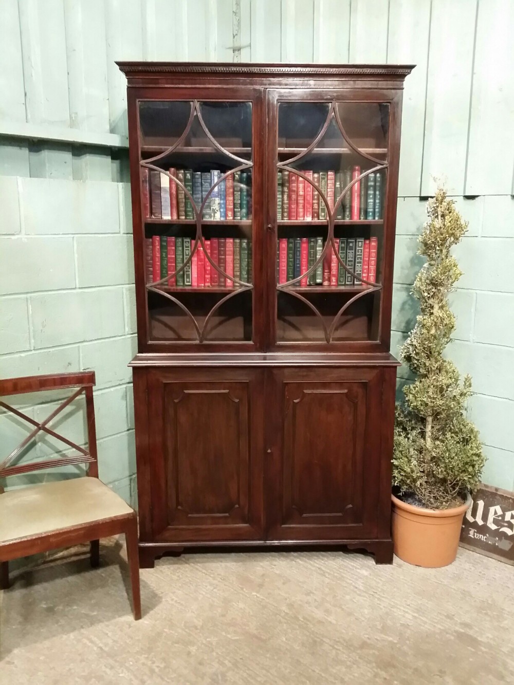 ANTIQUE REGENCY MAHOGANY ASTRAGAL GLAZED  BOOKCASE ON CUPBOARD C1820