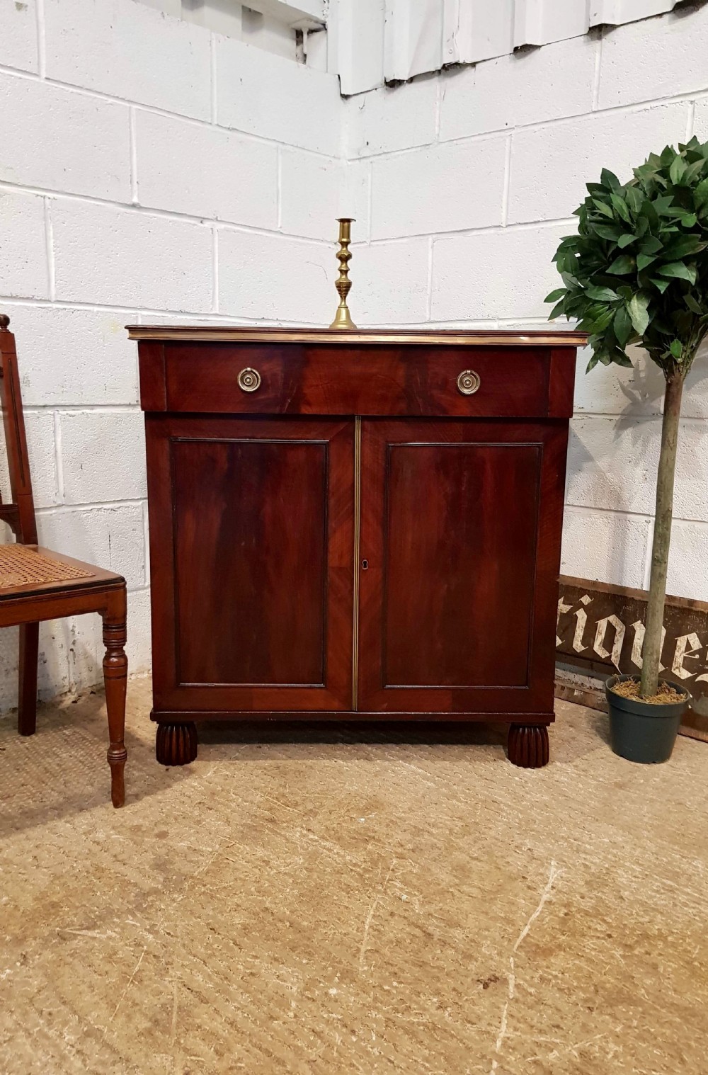 ANTIQUE SMALL REGENCY CUBAN MAHOGANY SIDE CABINET with  Brass Gilt fittings c1820