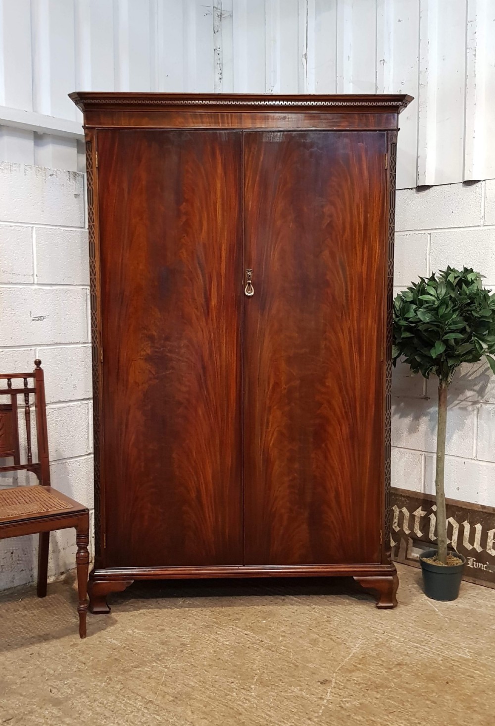 ANTIQUE FLAMED MAHOGANY CHIPPENDALE STYLE LOW DOUBLE WARDROBE C1920