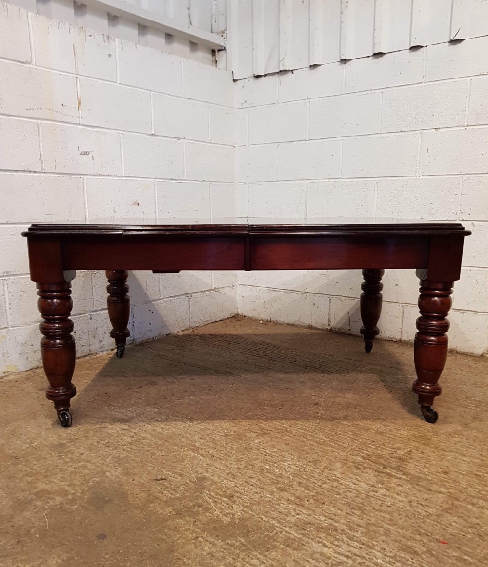 ANTIQUE VICTORIAN MAHOGANY EXTENDING DINING TABLE SEATS UP TO 10-12. C1880 View IV