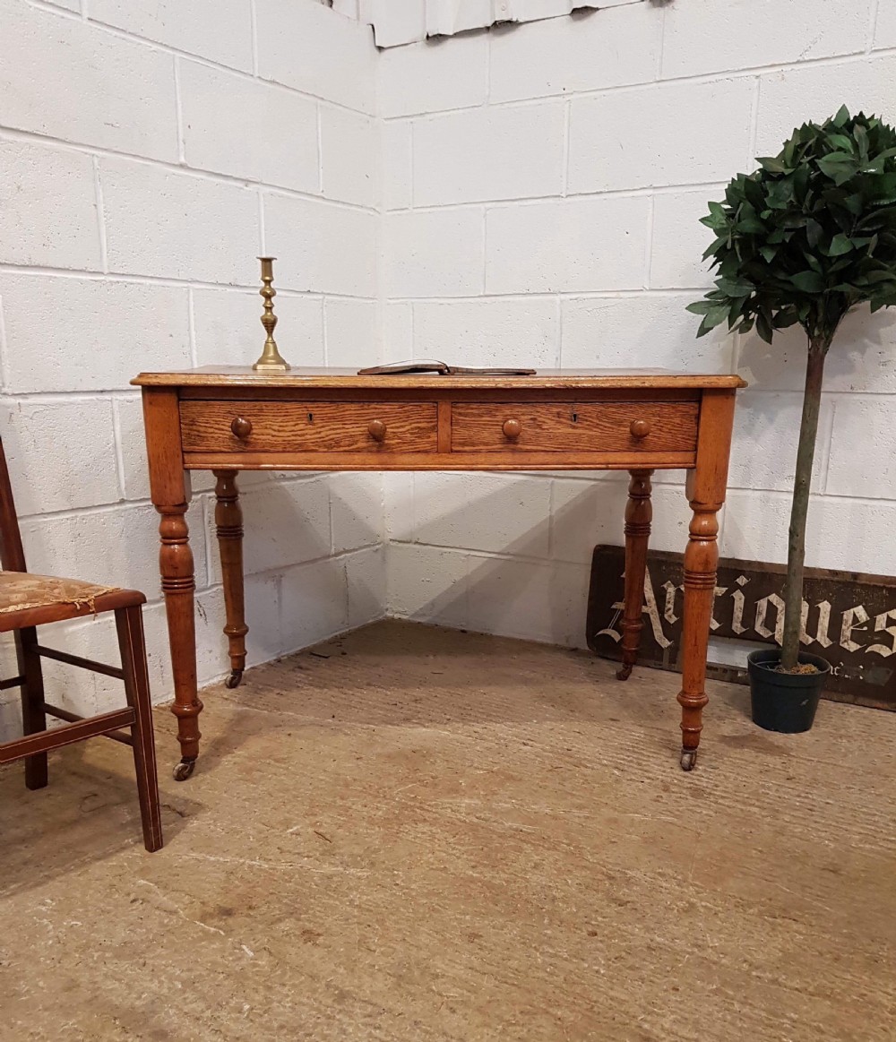 ANTIQUE VICTORIAN OAK LEATHER TOPPED WRITING TABLE C1880