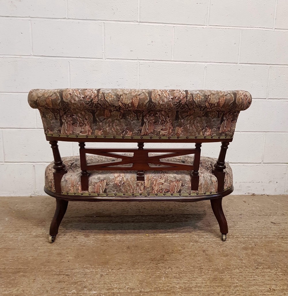 ANTIQUE SMALL FRENCH MAHOGANY SERPENTINE SHAPED SOFA C1900 View V