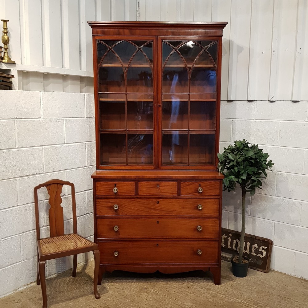 ANTIQUE REGENCY MAHOGANY ASTRAGAL GLAZED BOOKCASE ON CHEST C1820