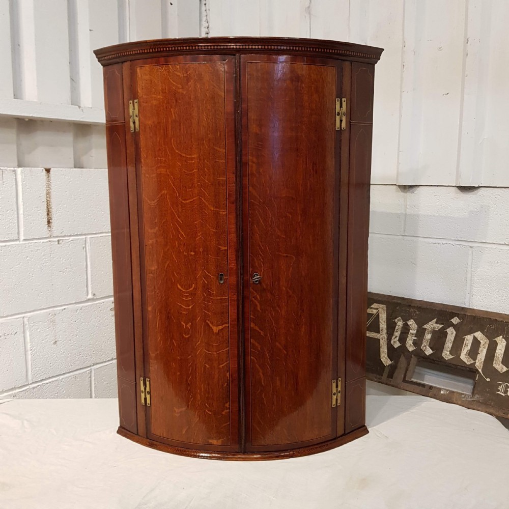 ANTIQUE GEORGIAN PERIOD OAK & MAHOGANY BOW FRONT CORNER CABINET C1780