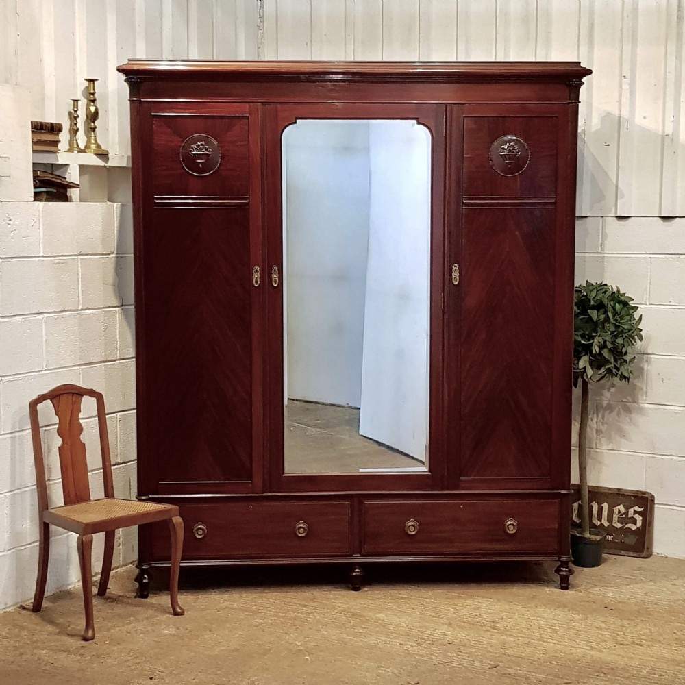 ANTIQUE LATE VICTORIAN CUBAN MAHOGANY TRIPLE WARDROBE C1890