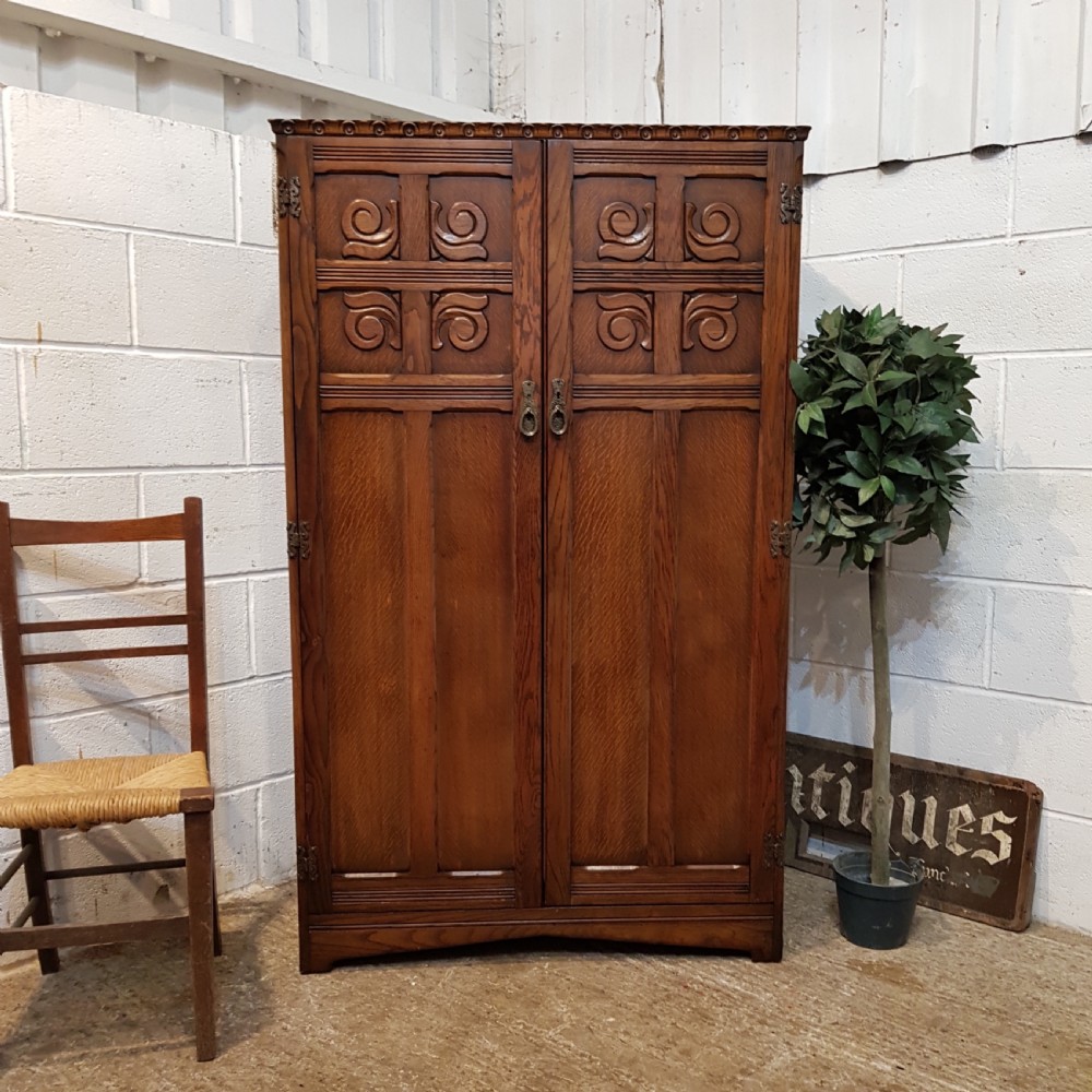 ANTIQUE SMALL CARVED OAK DOUBKE WARDROBE C1920