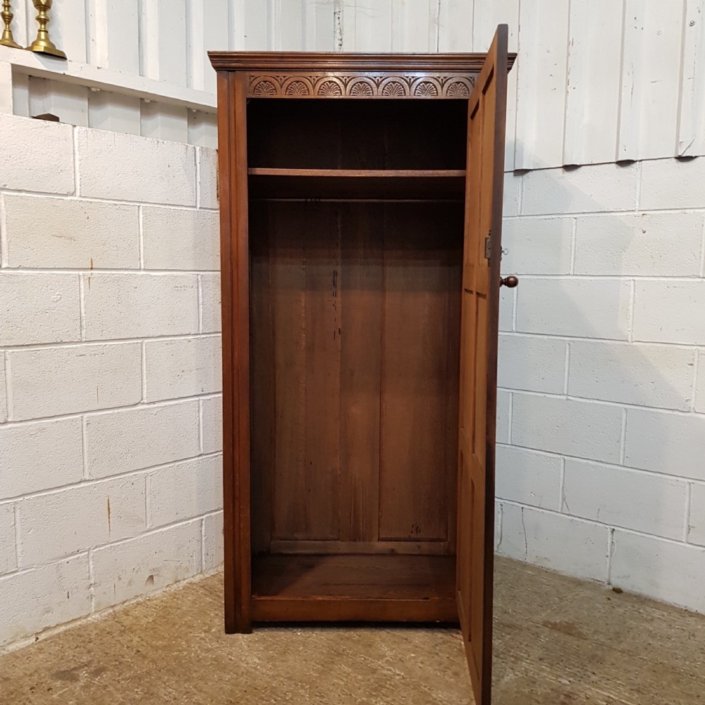 ANTIQUE PAIR OF CARVED JOINED OAK SINGLE WARDROBES BY DENBY & SPINKS C1920 View VI