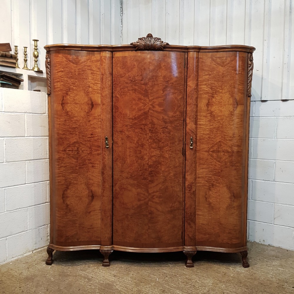 ANTIQUE BURR WALNUT SERPENTINE SHAPED TRIPLE WARDROBE C1920 View II