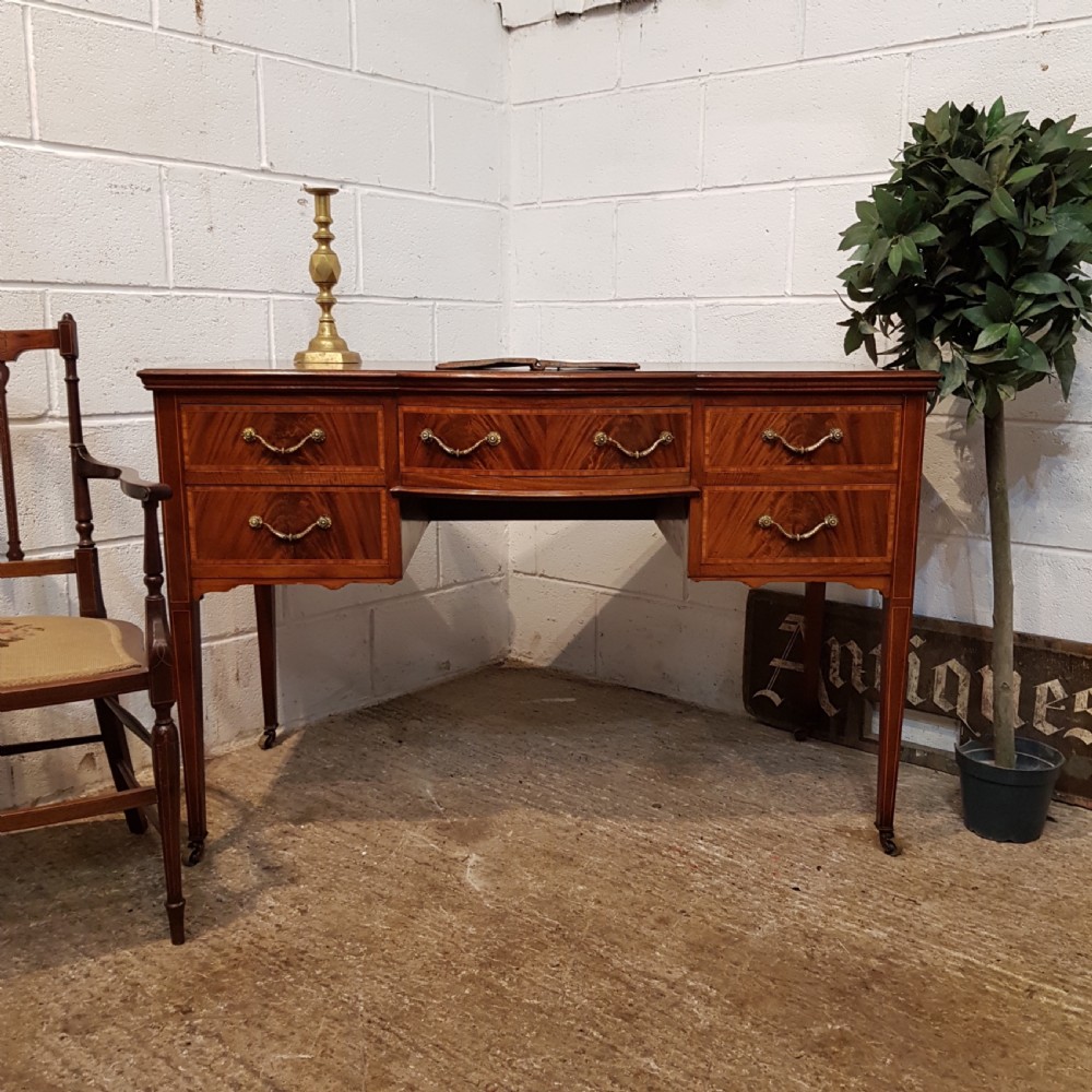 ANTIQUE EDWARDIAN MAHOGANY SERPENTINE FRONTED WRITING TABLE C1900