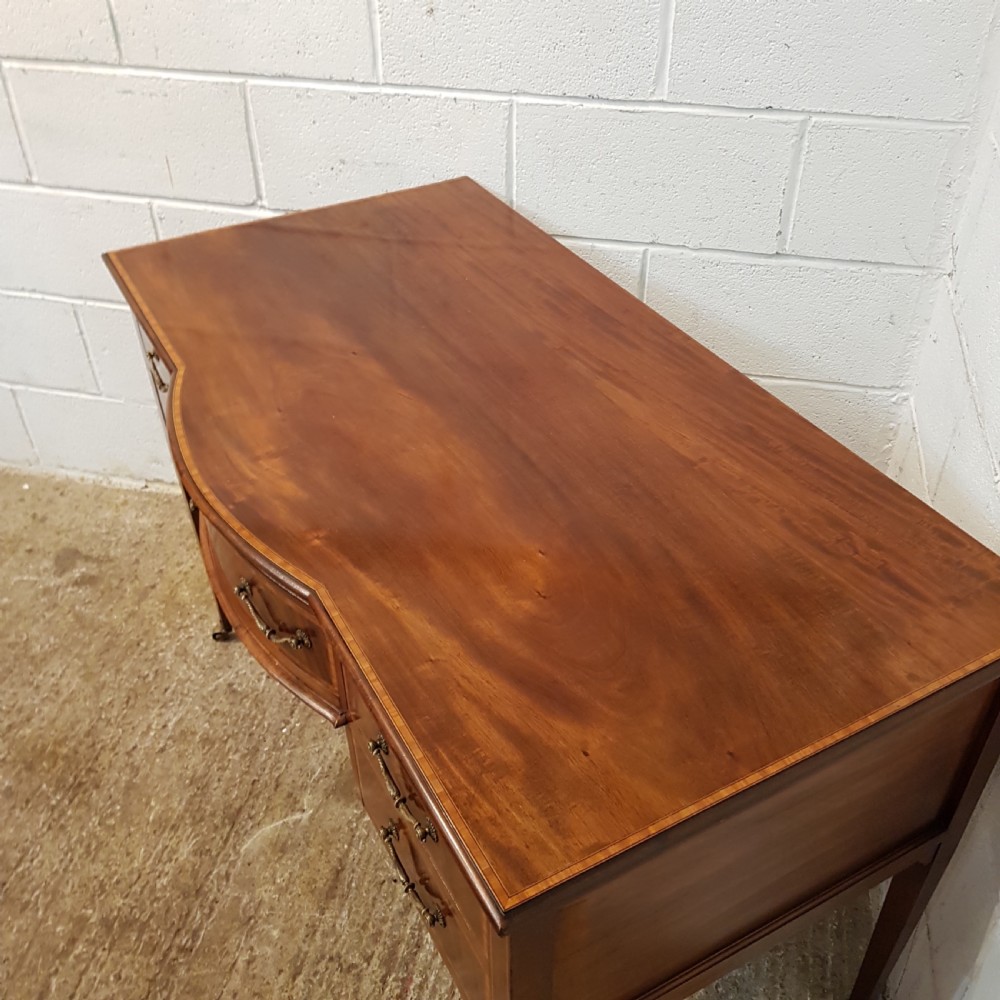 ANTIQUE EDWARDIAN MAHOGANY SERPENTINE FRONTED WRITING TABLE C1900 View IV