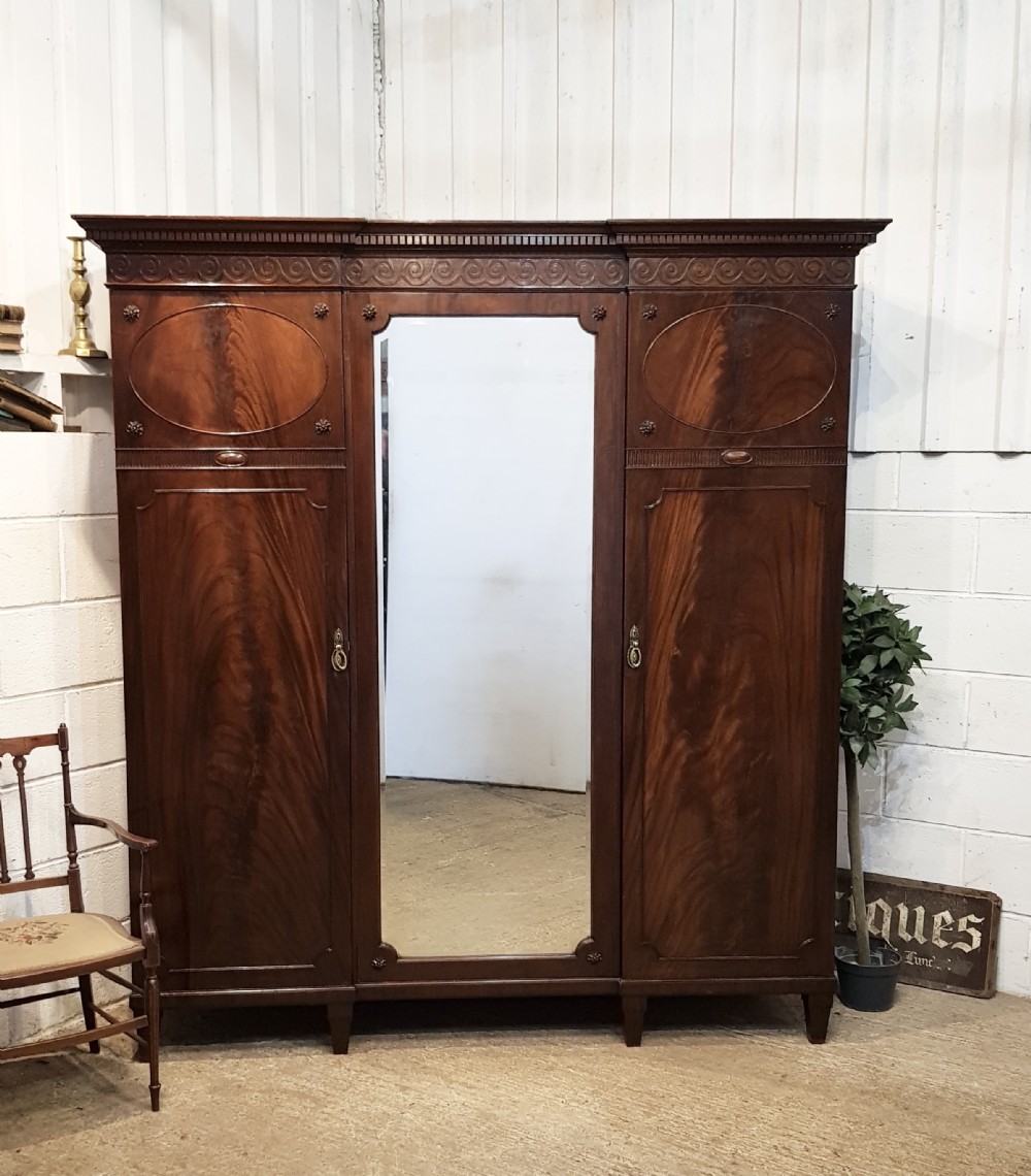 ANTIQUE EDWARDIAN CHIPPENDALE MAHOGANY  BREAKFRONT TRIPLE WARDROBE C1900 