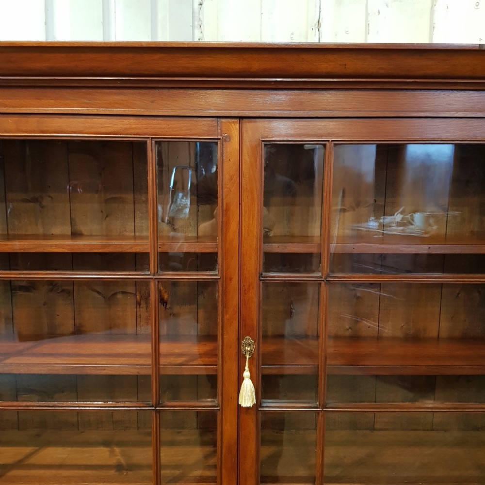 ANTIQUE EDWARDIAN LOW MAHOGANY GLAZED BOOKCASE ON CUPBOARD C1900 View III
