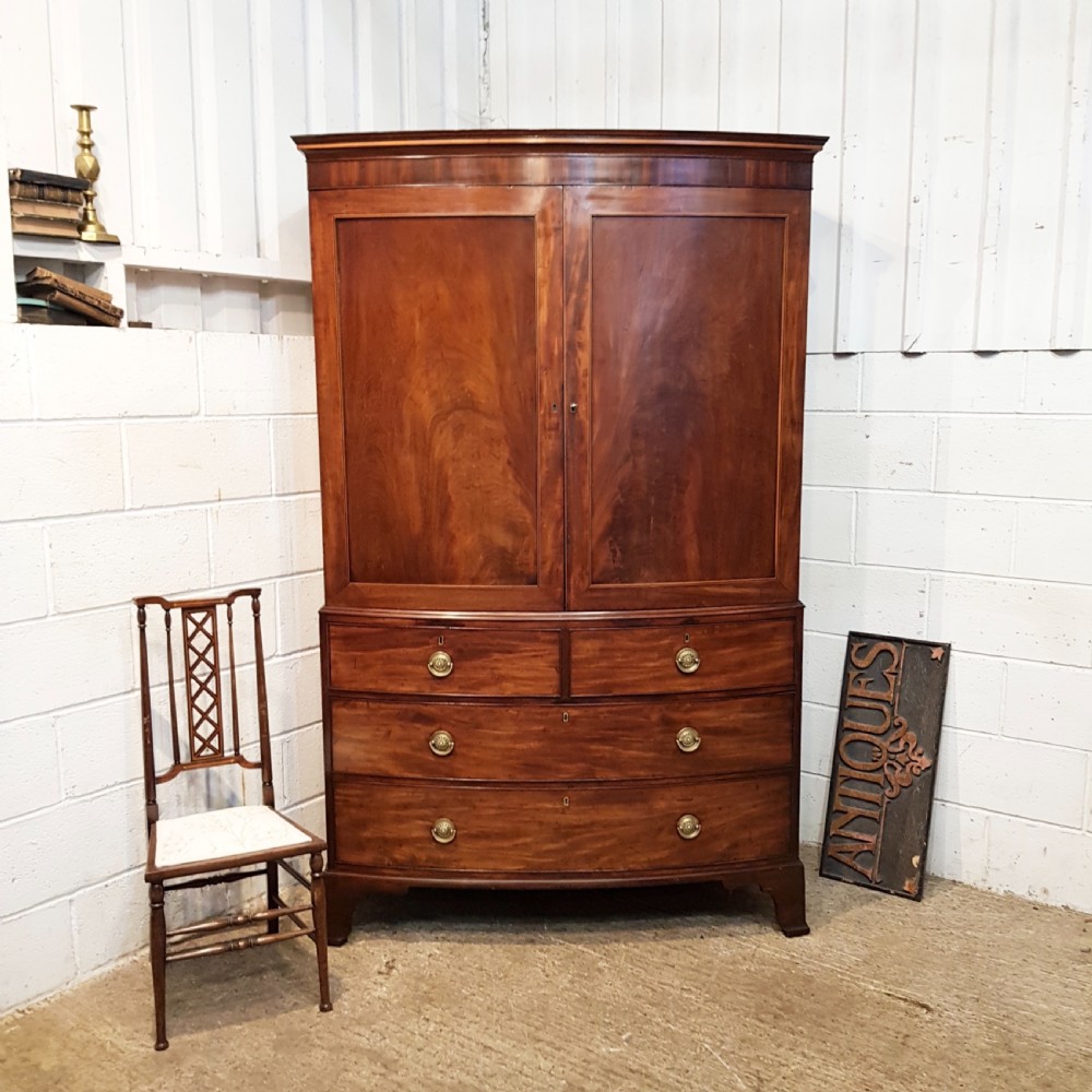 ANTIQUE REGENCY MAHOGANY BOW FRONT CLOTHES PRESS C1820