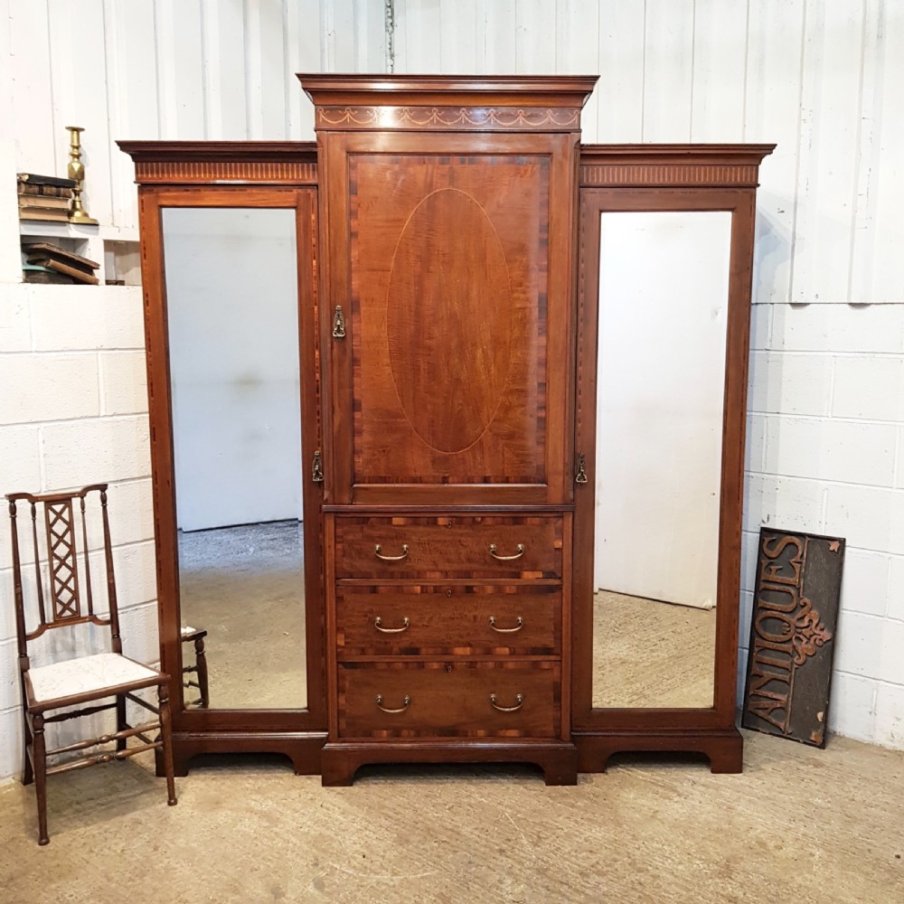 ANTIQUE VICTORIAN REGENCY MAHOGANY BREAKFRONT TRIPLE WARDROBE BY MAPLE & CO.C1890