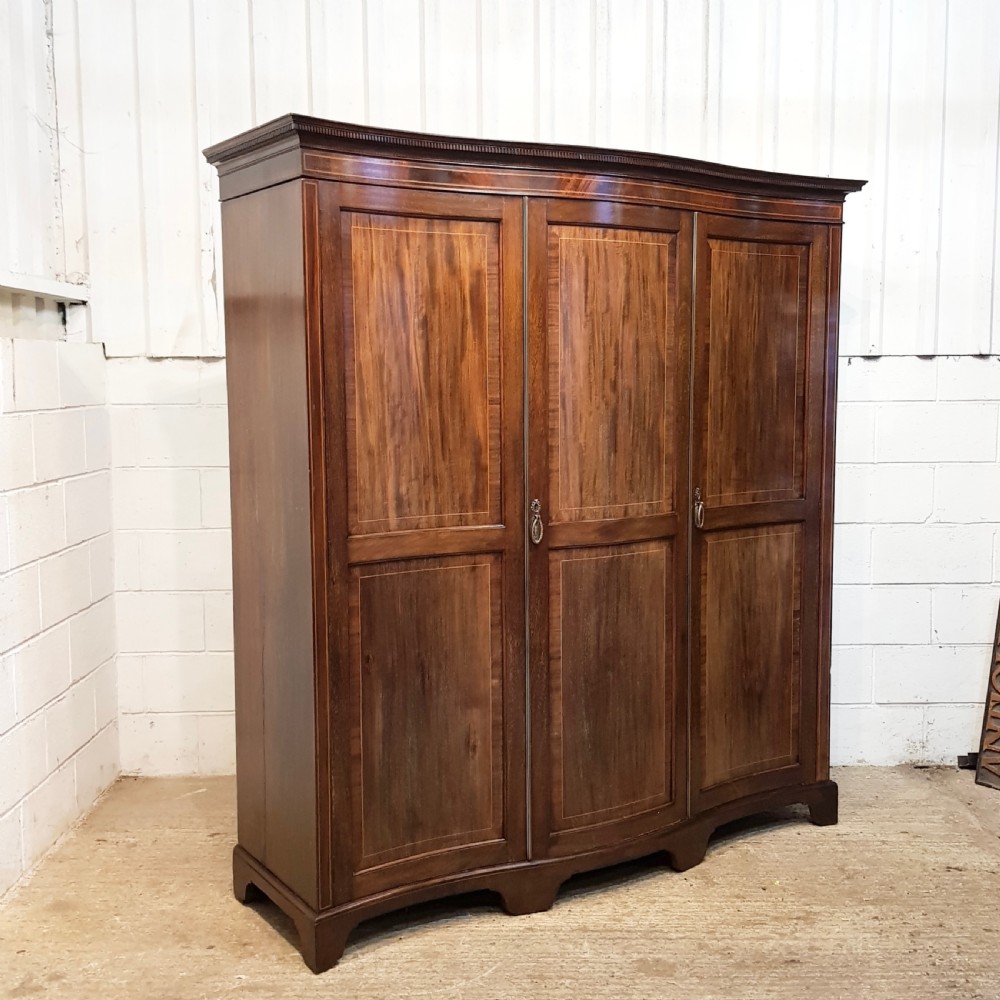 ANTIQUE EDWARDIAN MAHOGANY SERPENTINE SHAPE TRIPLE WARDROBE C1900 View II
