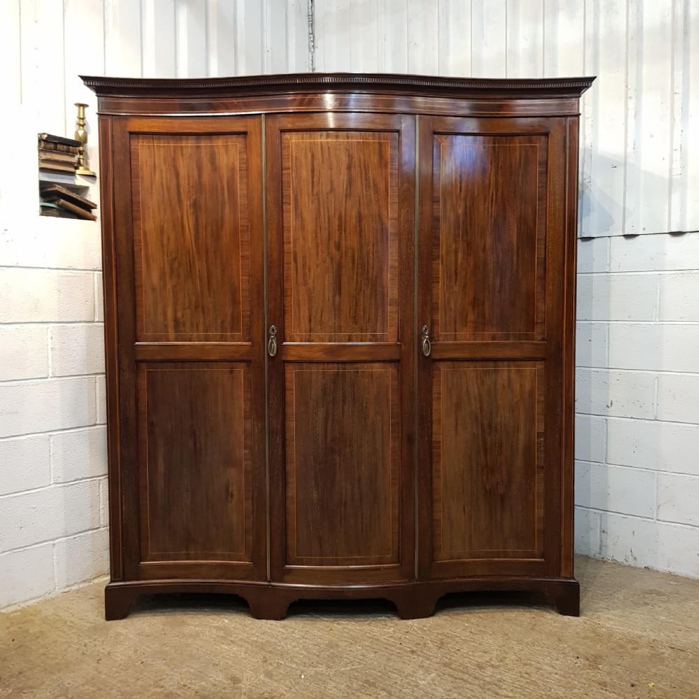 ANTIQUE EDWARDIAN MAHOGANY SERPENTINE SHAPE TRIPLE WARDROBE C1900 View IV