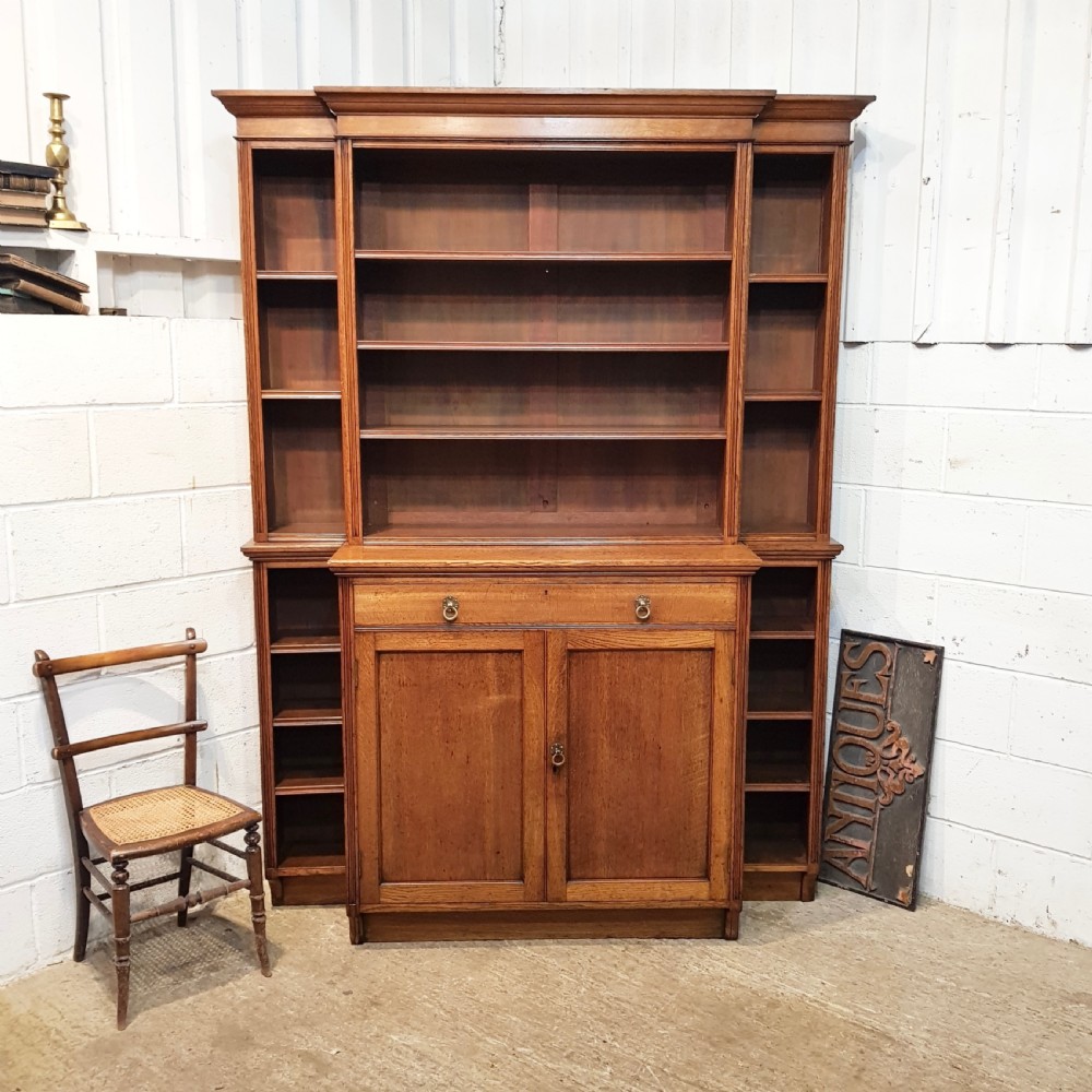 ANTIQUE LATE VICTORIAN OAK BREAKFRONT OPEN BOOKCASE C1890