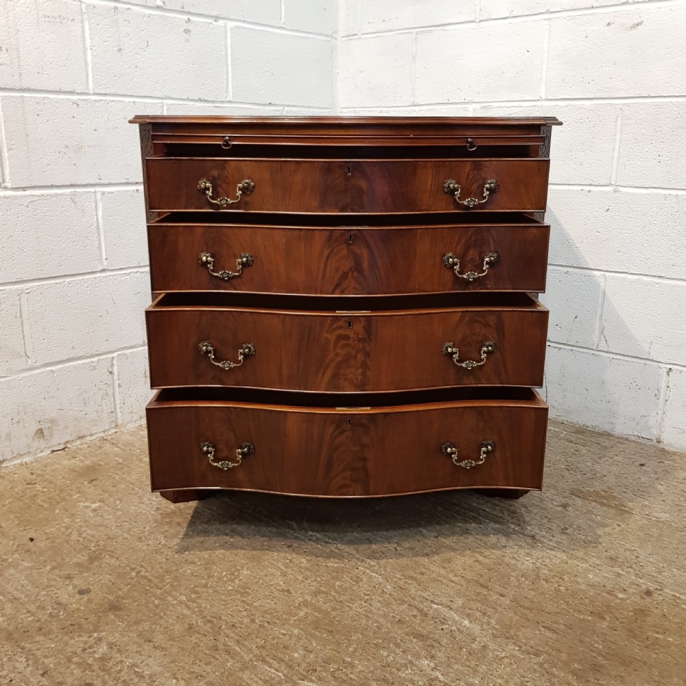 ANTIQUE MAHOGANY SERPENTINE FRONT CHEST OF DRAWERS WITH BRUSHING SLIDE C1920 View VII