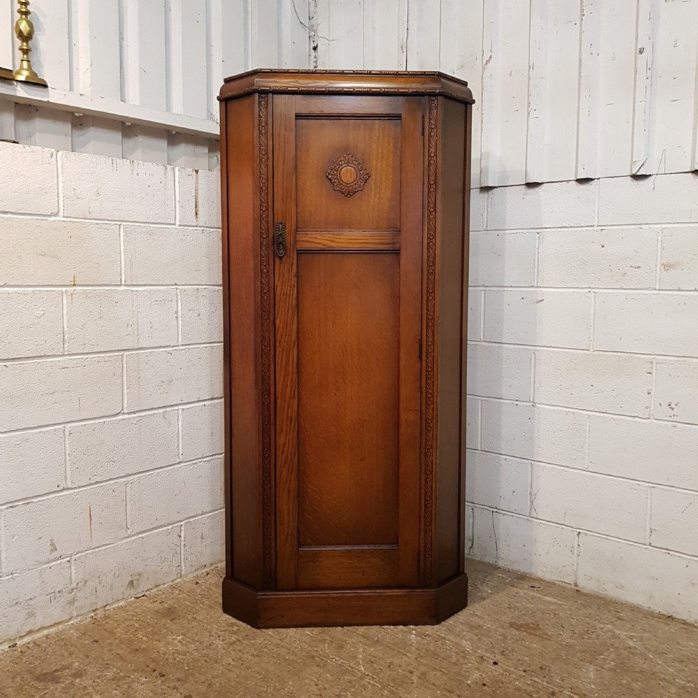 ANTIQUE CARVED OAK CORNER WARDROBE C1920 View II