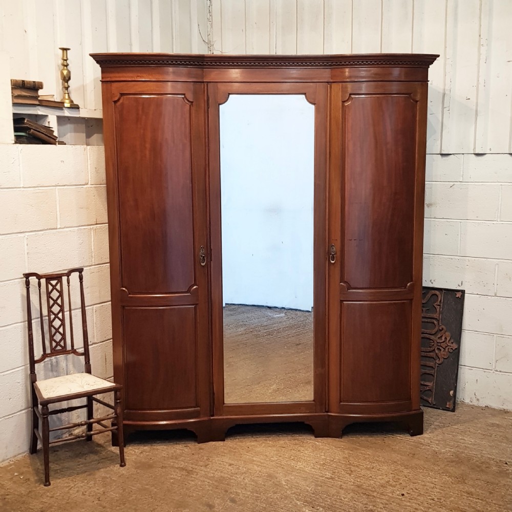 ANTIQUE EDWARDIAN MAHOGANY BOW FRONT TRIPLE WARDROBE C1900
