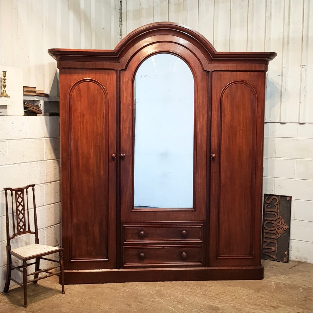 ANTIQUE VICTORIAN MAHOGANY ARCHED TOP TRIPLE WARDROBE C1880