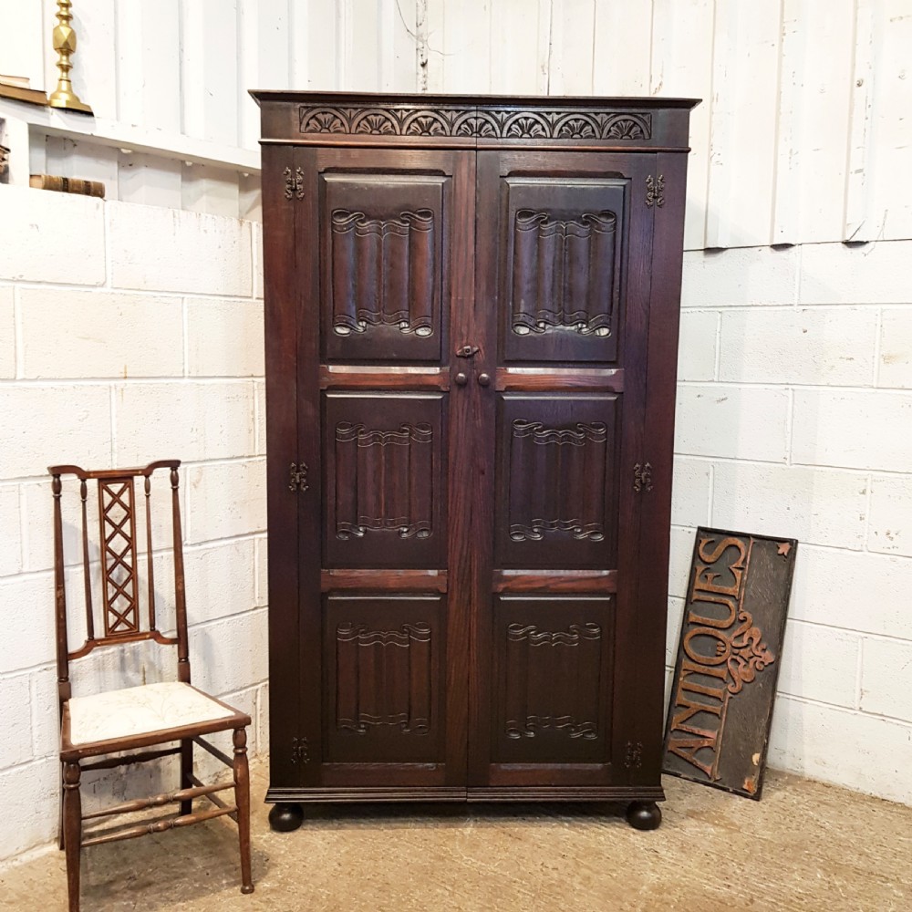 ANTIQUE CARVED OAK LINEN FOLD DOUBLE WARDROBE C1920