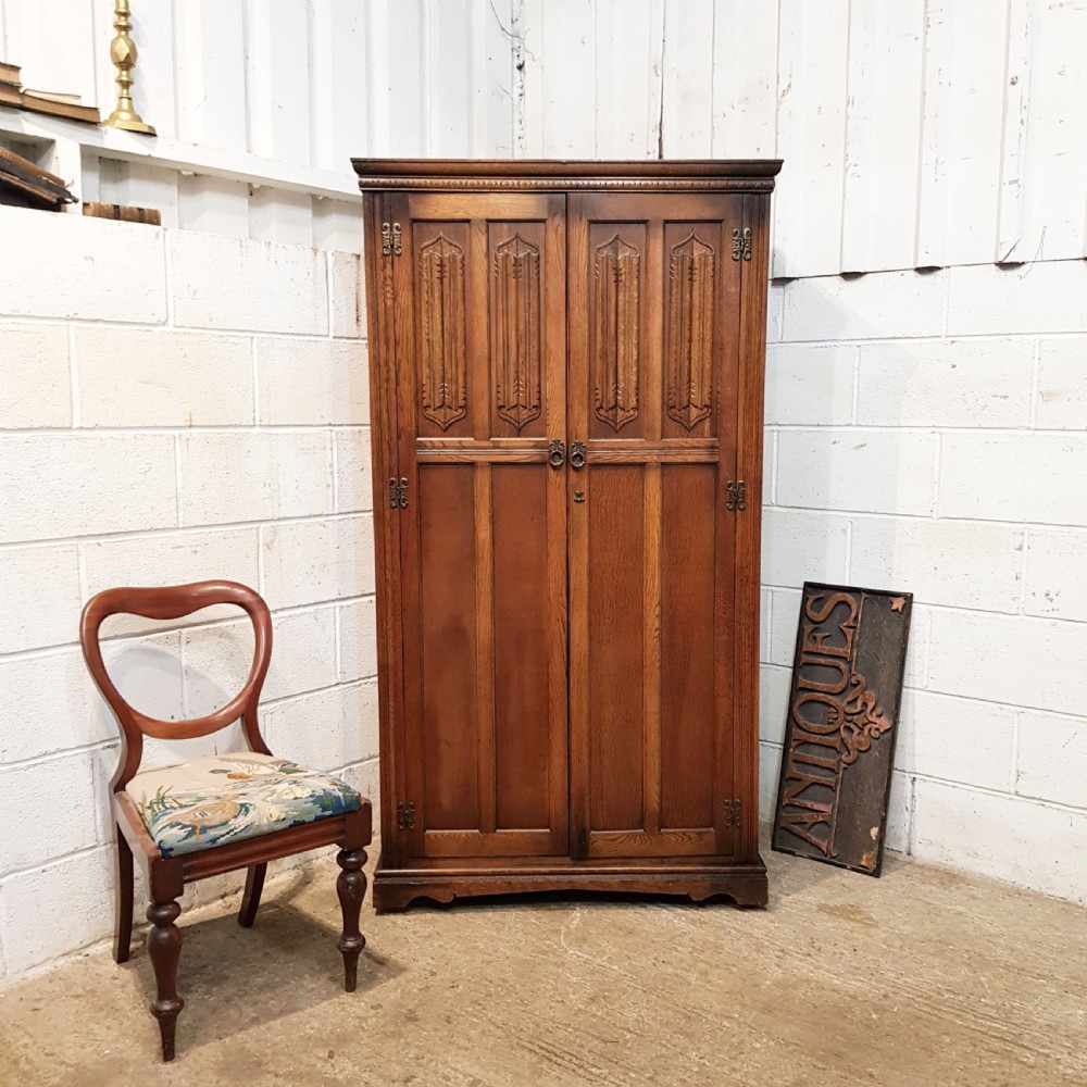 ANTIQUE CARVED OAK LINEN FOLD FITTED DOUBLE WARDROBE C1920
