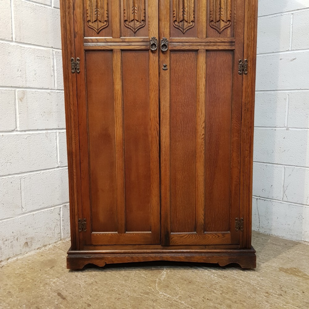 ANTIQUE CARVED OAK LINEN FOLD FITTED DOUBLE WARDROBE C1920 View III