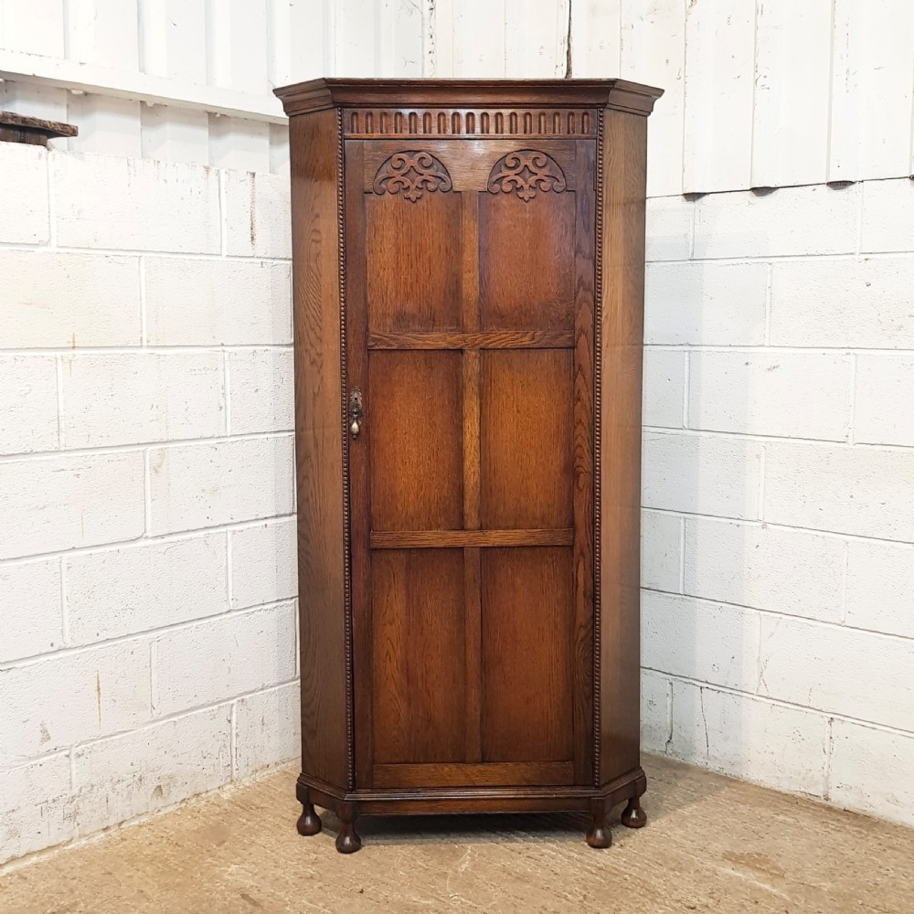 ANTIQUE CARVED OAK CORNER WARDROBE C1920 View II
