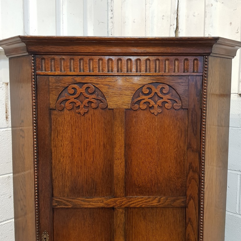 ANTIQUE CARVED OAK CORNER WARDROBE C1920 View IV