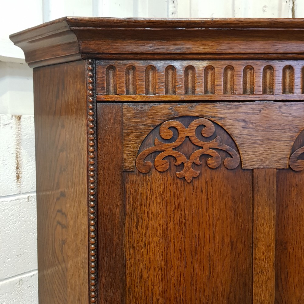ANTIQUE CARVED OAK CORNER WARDROBE C1920 View V
