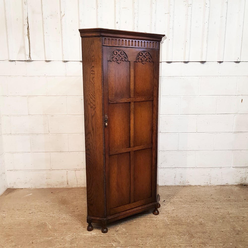 ANTIQUE CARVED OAK CORNER WARDROBE C1920 View VI