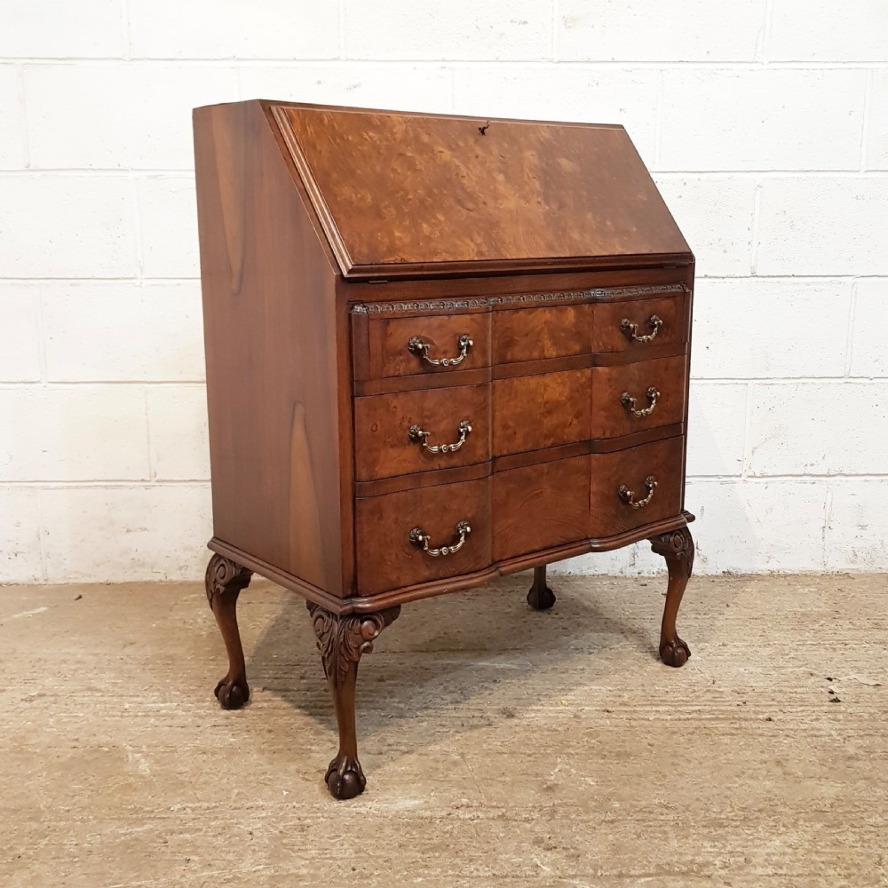 ANTIQUE BURR WALNUT SERPENTINE SHAPED BUREAU BY MAPLES & CO. C1920 View V