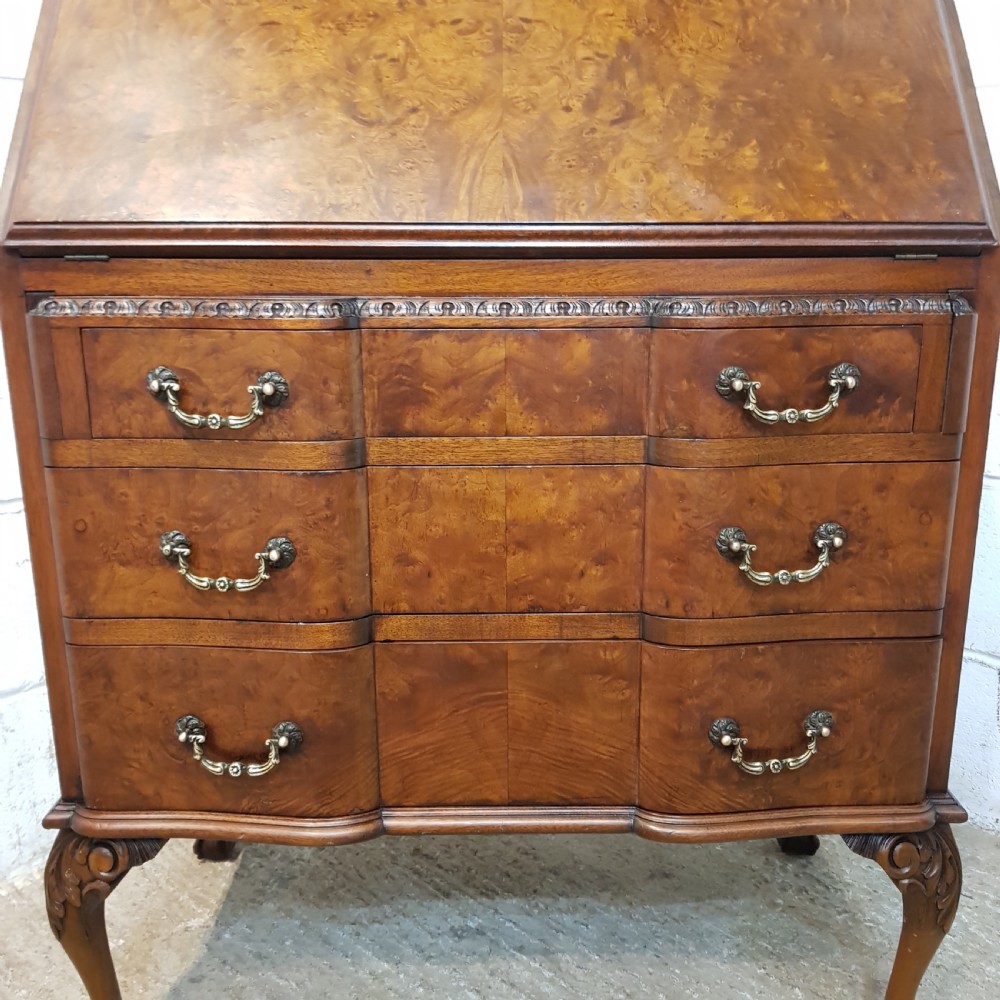 ANTIQUE BURR WALNUT SERPENTINE SHAPED BUREAU BY MAPLES & CO. C1920 View VI