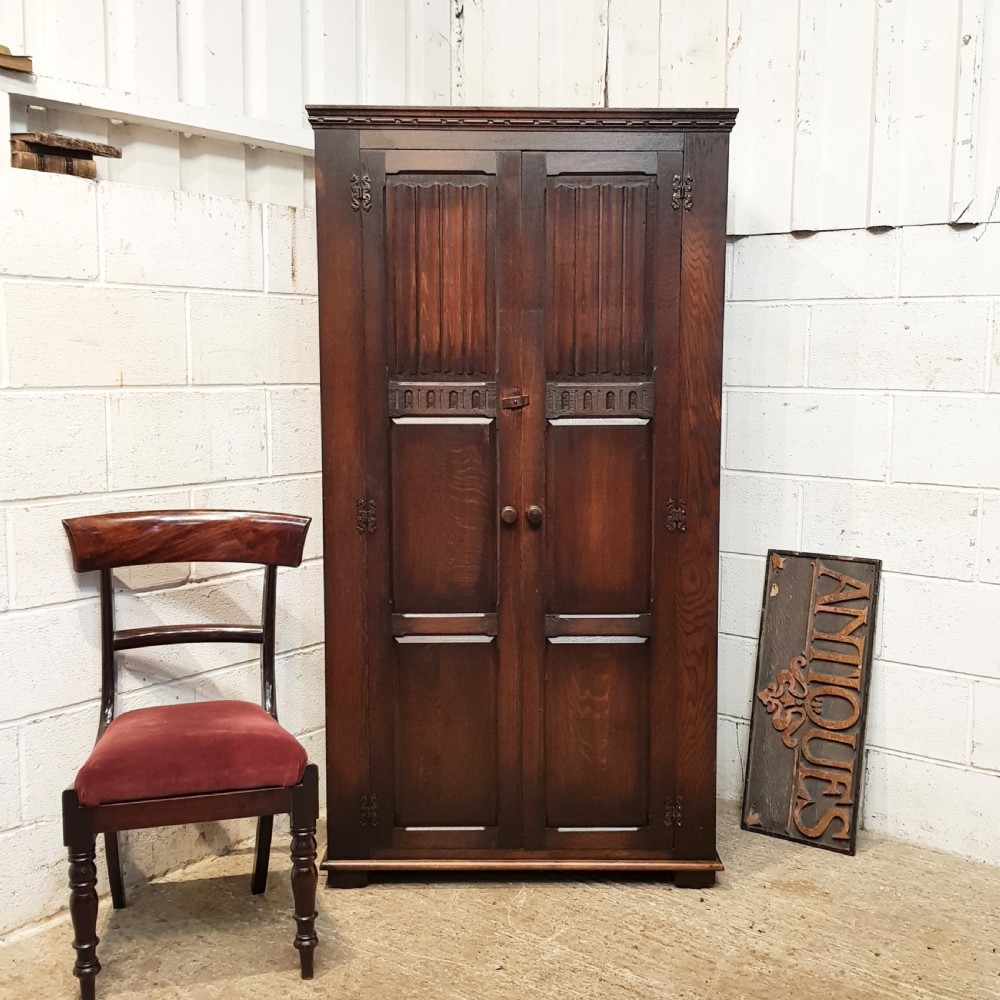 ANTIQUE OAK LNEN FOLD HALL WARDROBE C1920