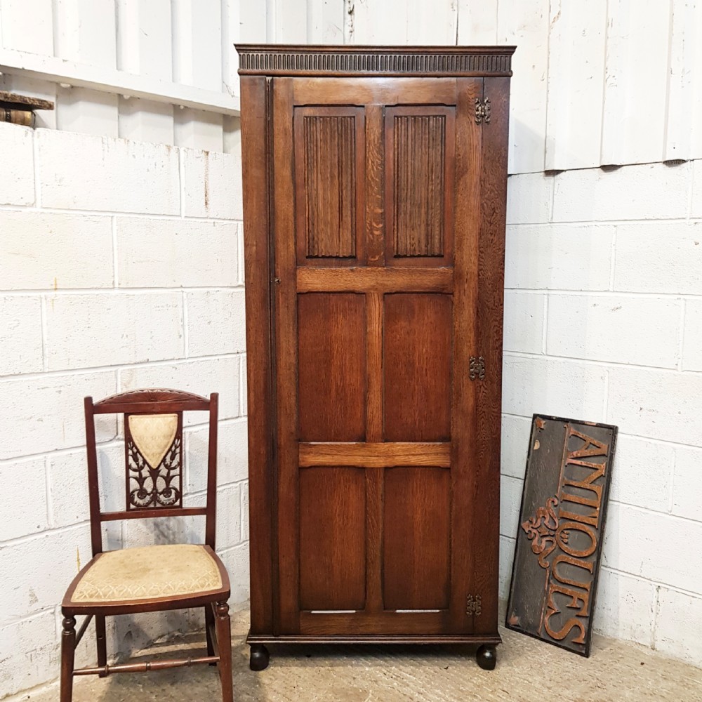 ANTIQUE OAK LINEN FOLD SINGLE WARDROBE  C1920