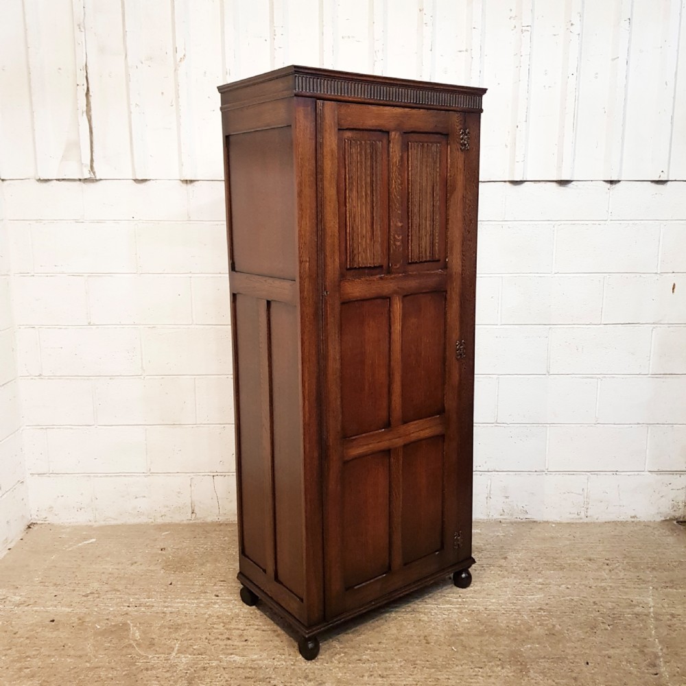 ANTIQUE OAK LINEN FOLD SINGLE WARDROBE  C1920 View V