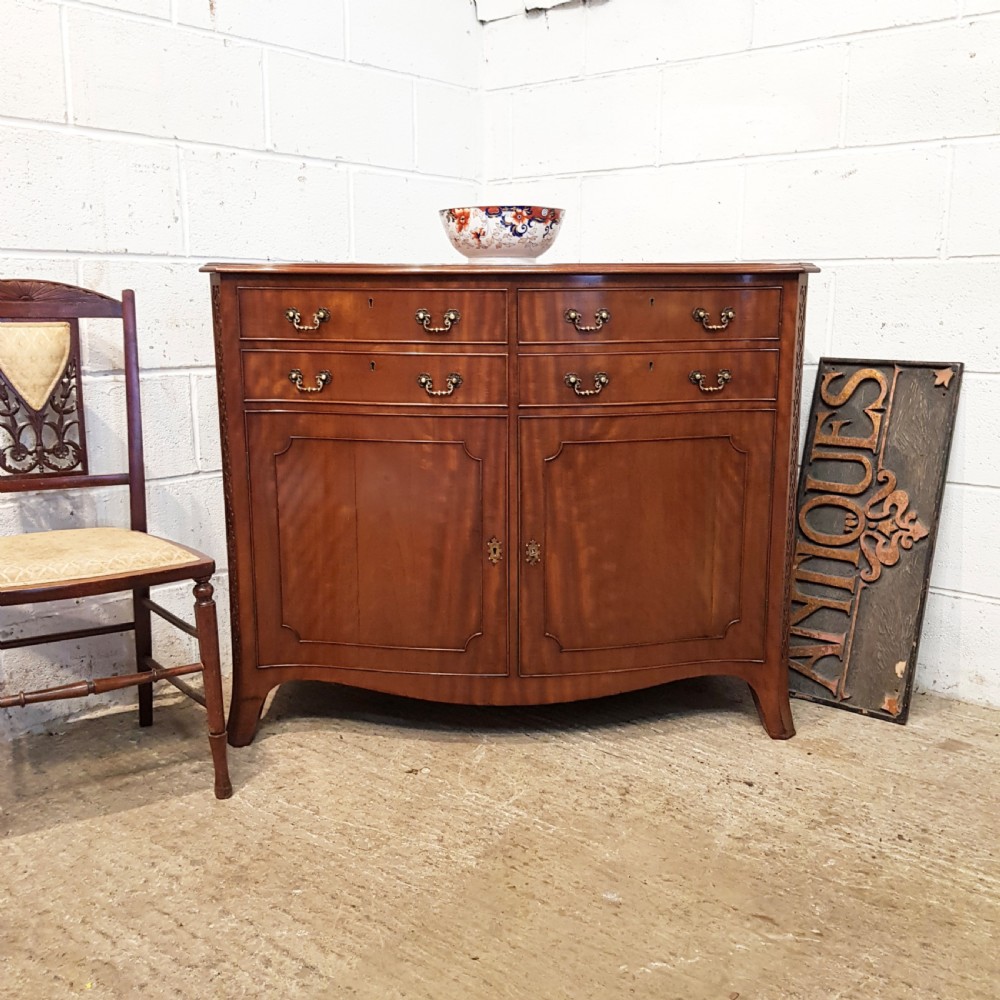 ANTIQUE EDWARDIAN SERPENTINE SHAPED MAHOGANY CABINET C1900