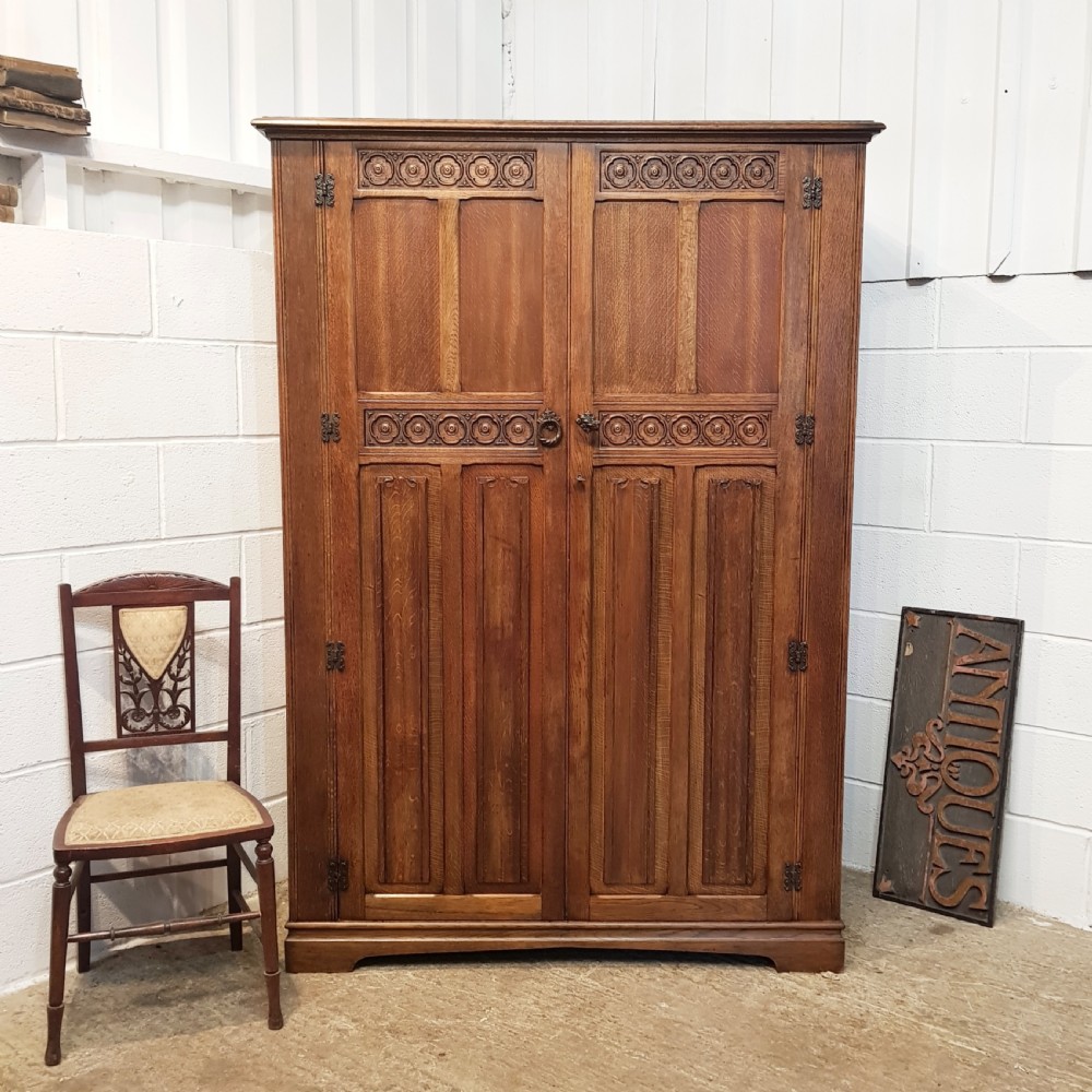 ANTIQUE CARVED OAK DOUBLE WARDROBE C1920
