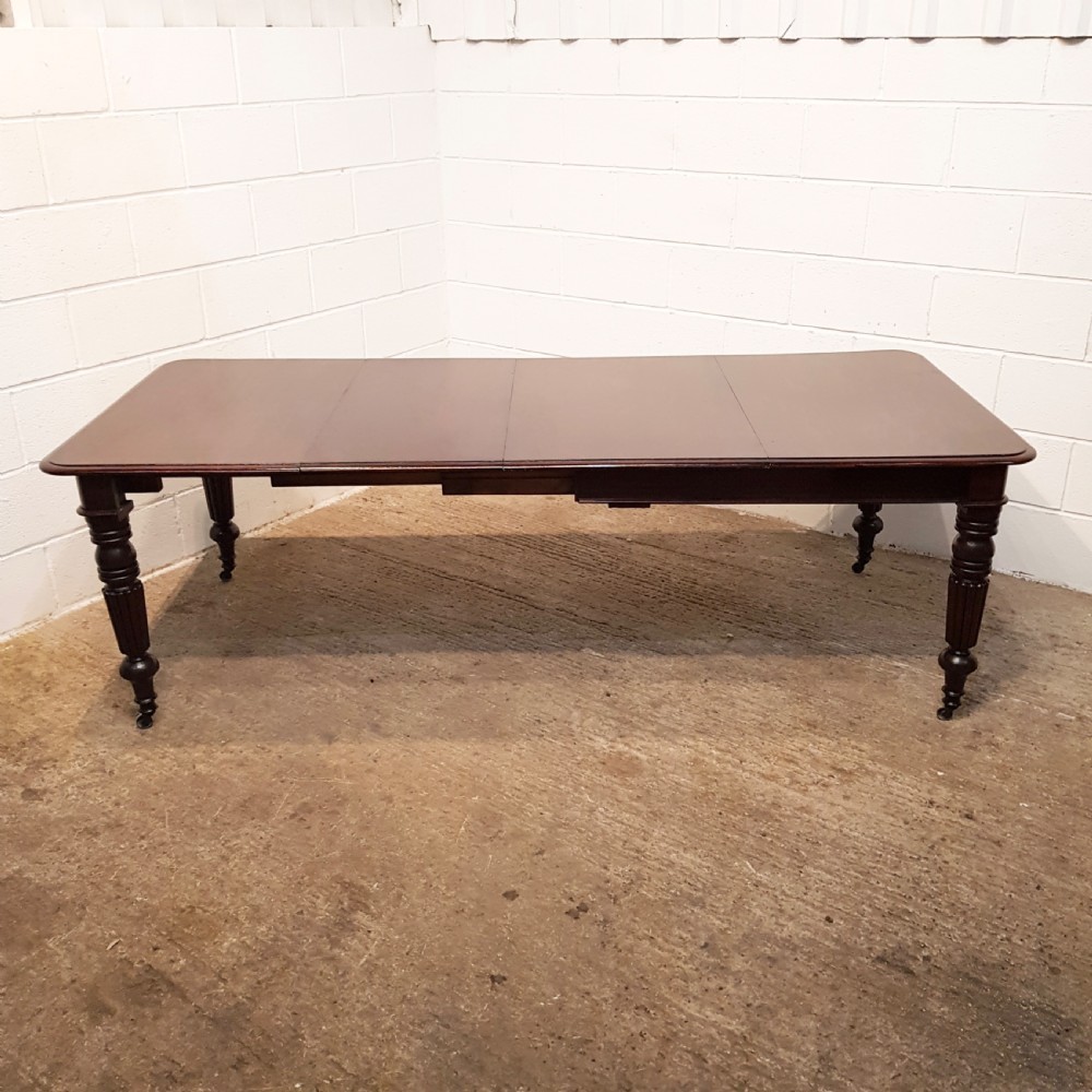 ANTIQUE VICTORIAN. MAHOGANY EXTENDING DINING TABLE SEATS 8-10 c1890 View V