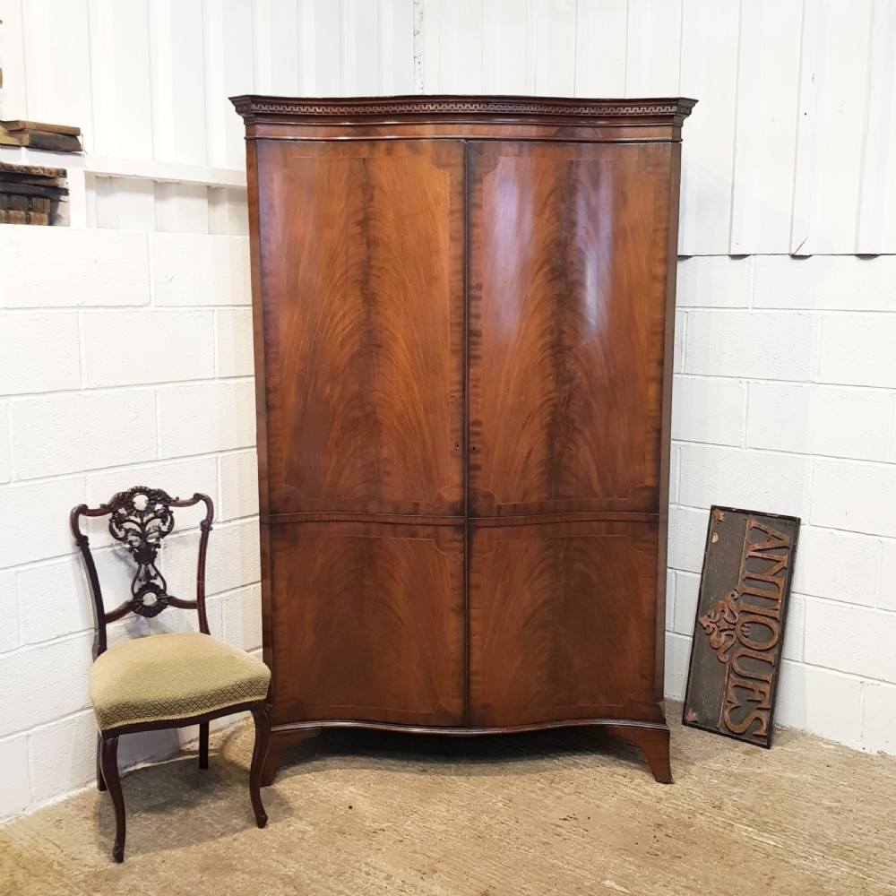 ANTIQUE MAHOGANY SERPENTINE FRONT MAHOGANY DOUBLE WARDROBE C1910