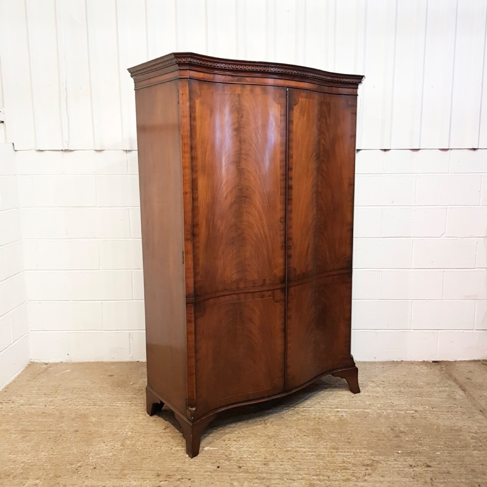 ANTIQUE MAHOGANY SERPENTINE FRONT MAHOGANY DOUBLE WARDROBE C1910 View II