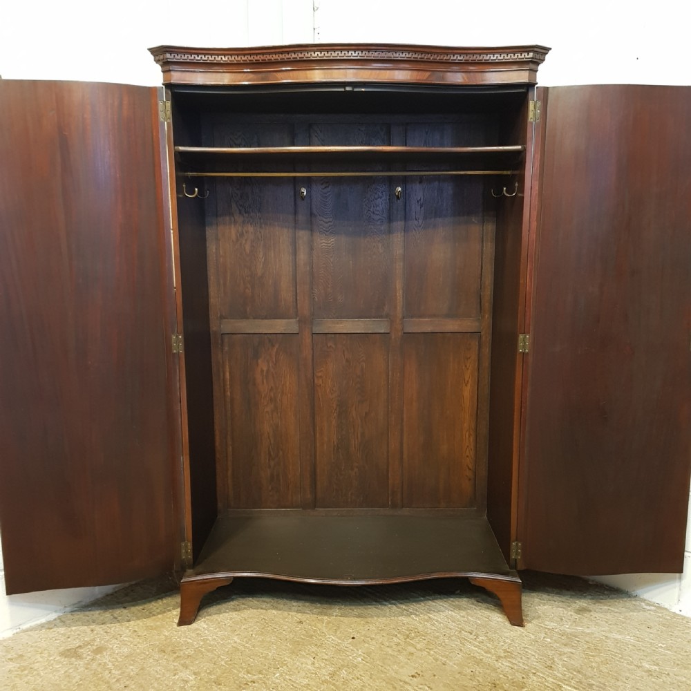 ANTIQUE MAHOGANY SERPENTINE FRONT MAHOGANY DOUBLE WARDROBE C1910 View III